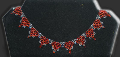 Red and gray with crystals necklace.